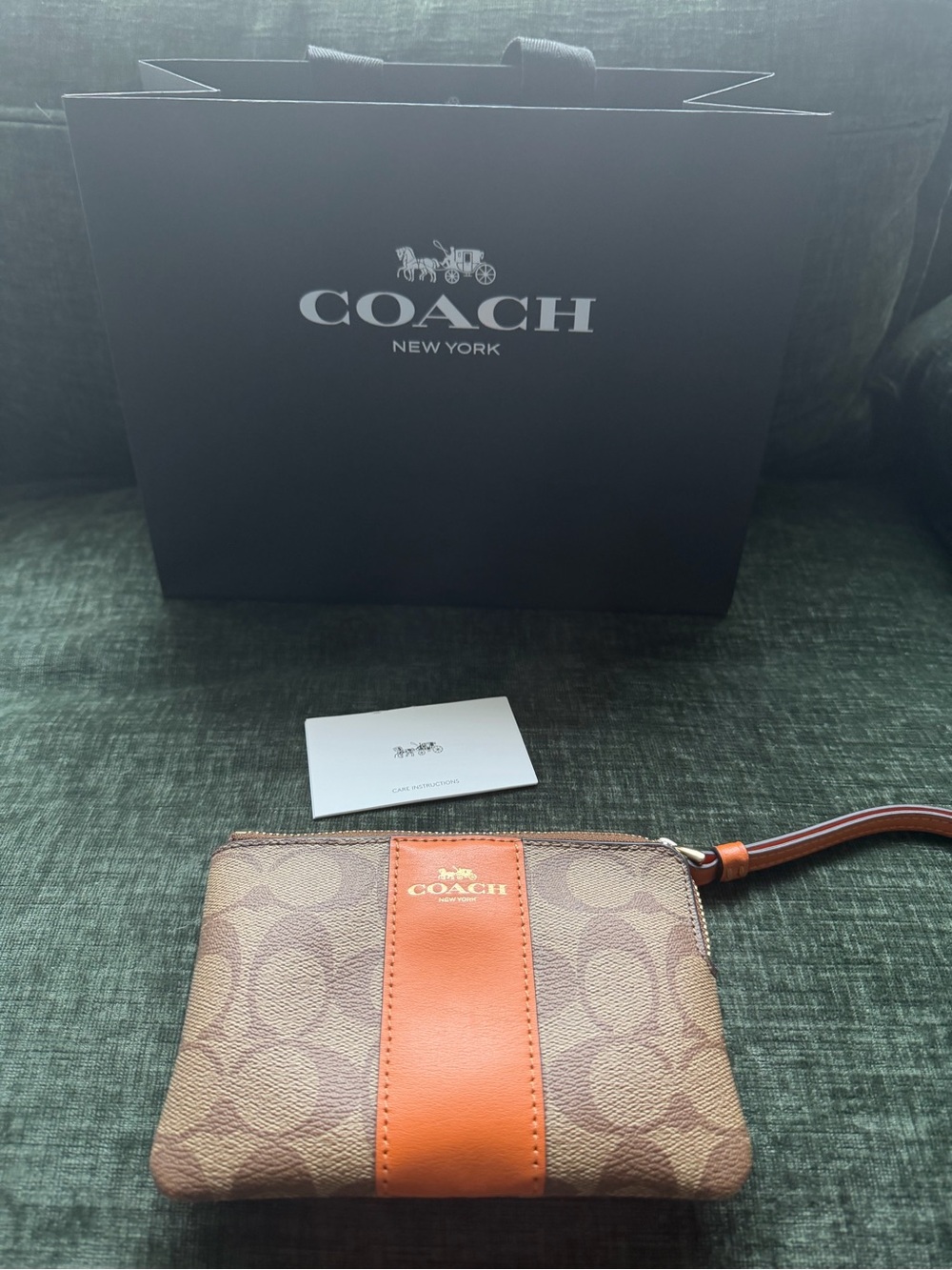 Coach Brown Signature Wristlet with Orange Center Stripe